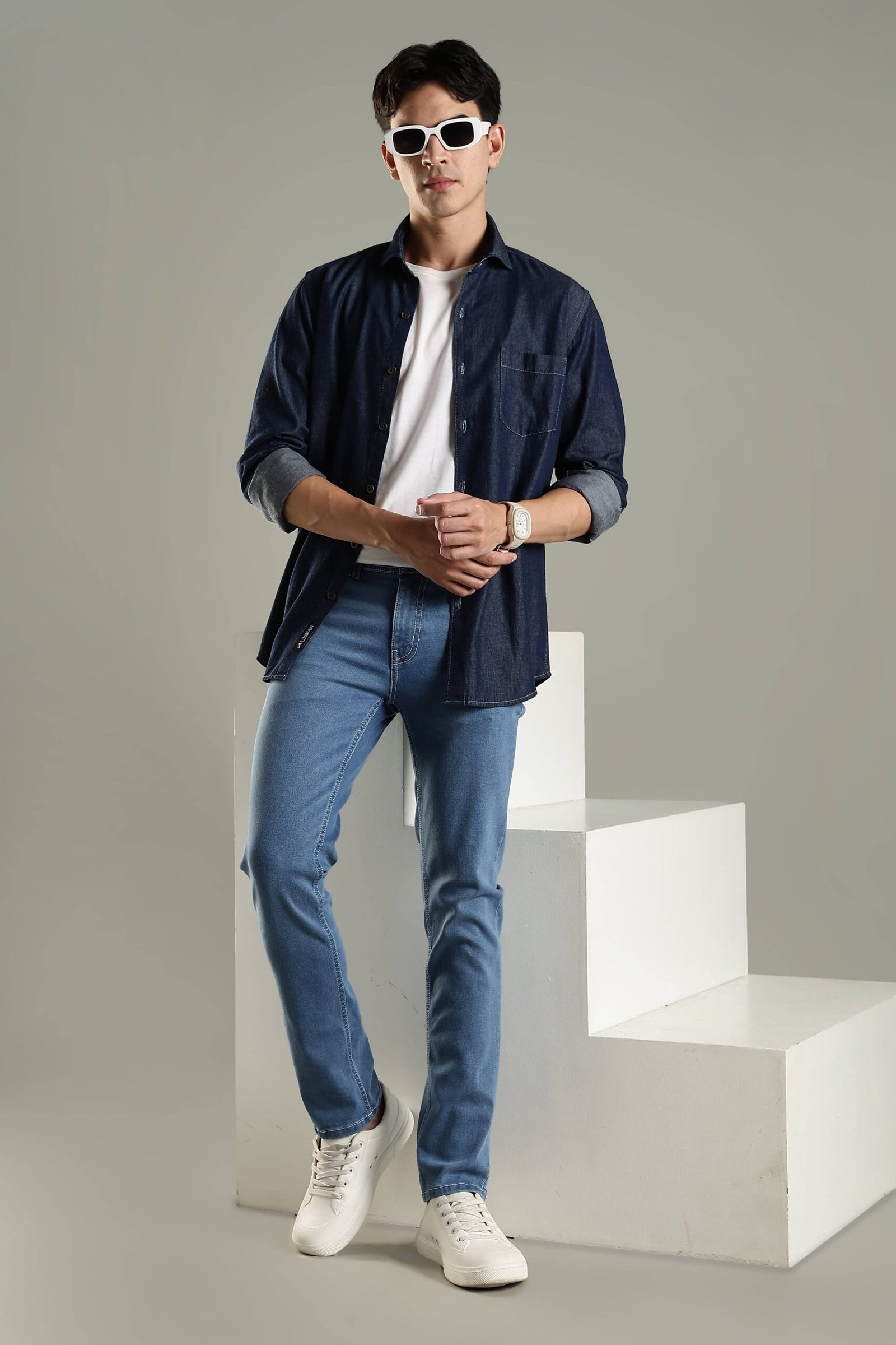 URWAN campaign — model in denim shirt and jeans